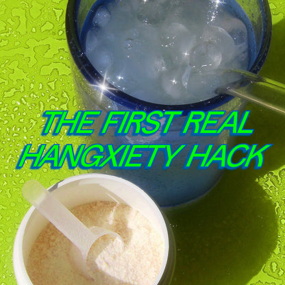 A blue glass cup filled with ice and a clear straw sits on a bright lime-green textured surface, alongside a small white container of white powder with a plastic scoop. Large stylized text across the center reads, 'THE FIRST REAL HANGXIETY HACK'.