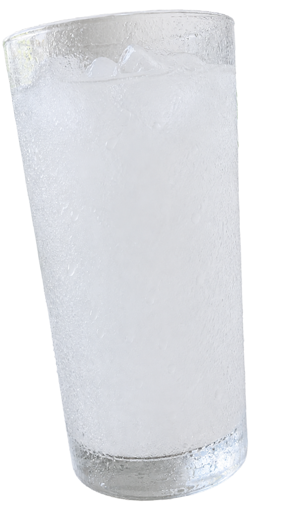 Glass of ice water floating